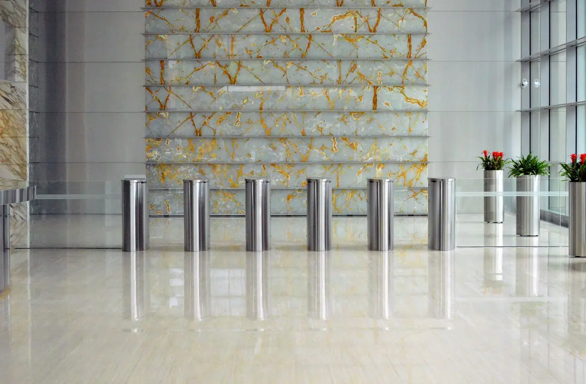 High-speed floor burnisher bringing up gloss on a freshly waxed floor