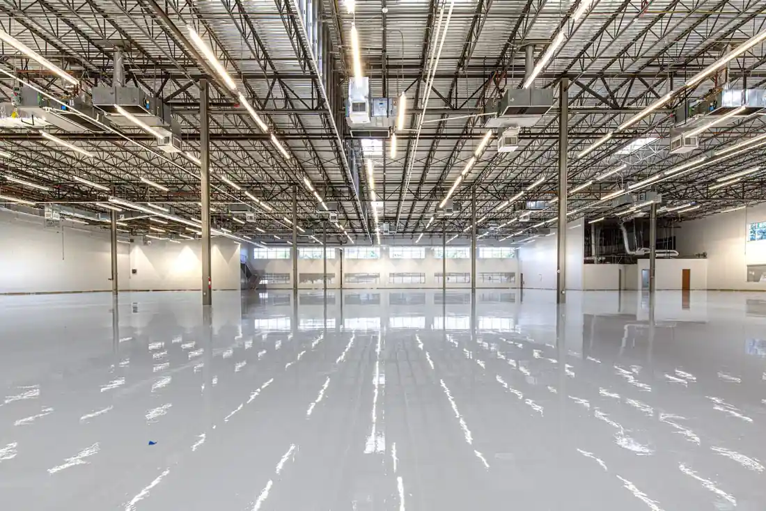 Glossy restored commercial floor running down a corporate corridor